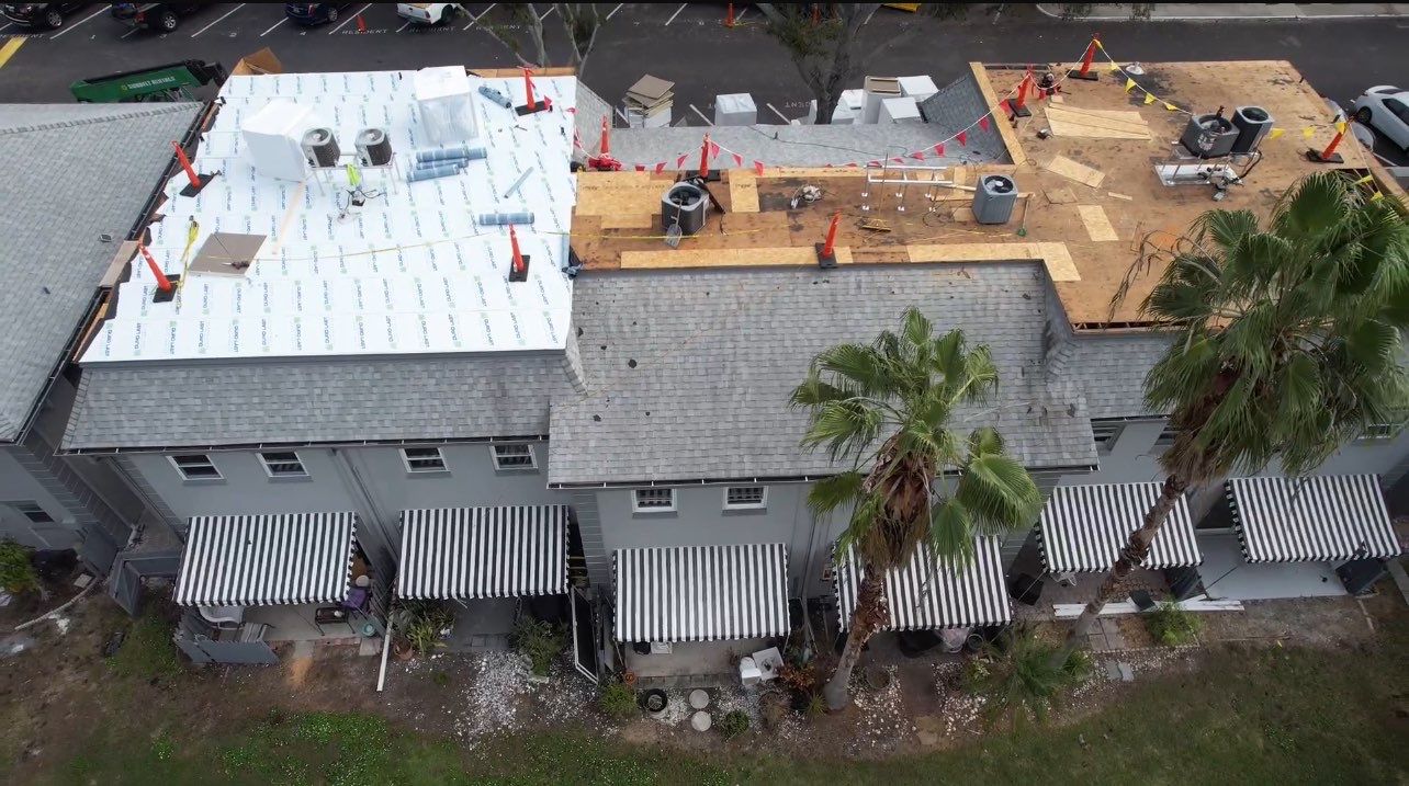 Les Chateaux mixed roof system replacement