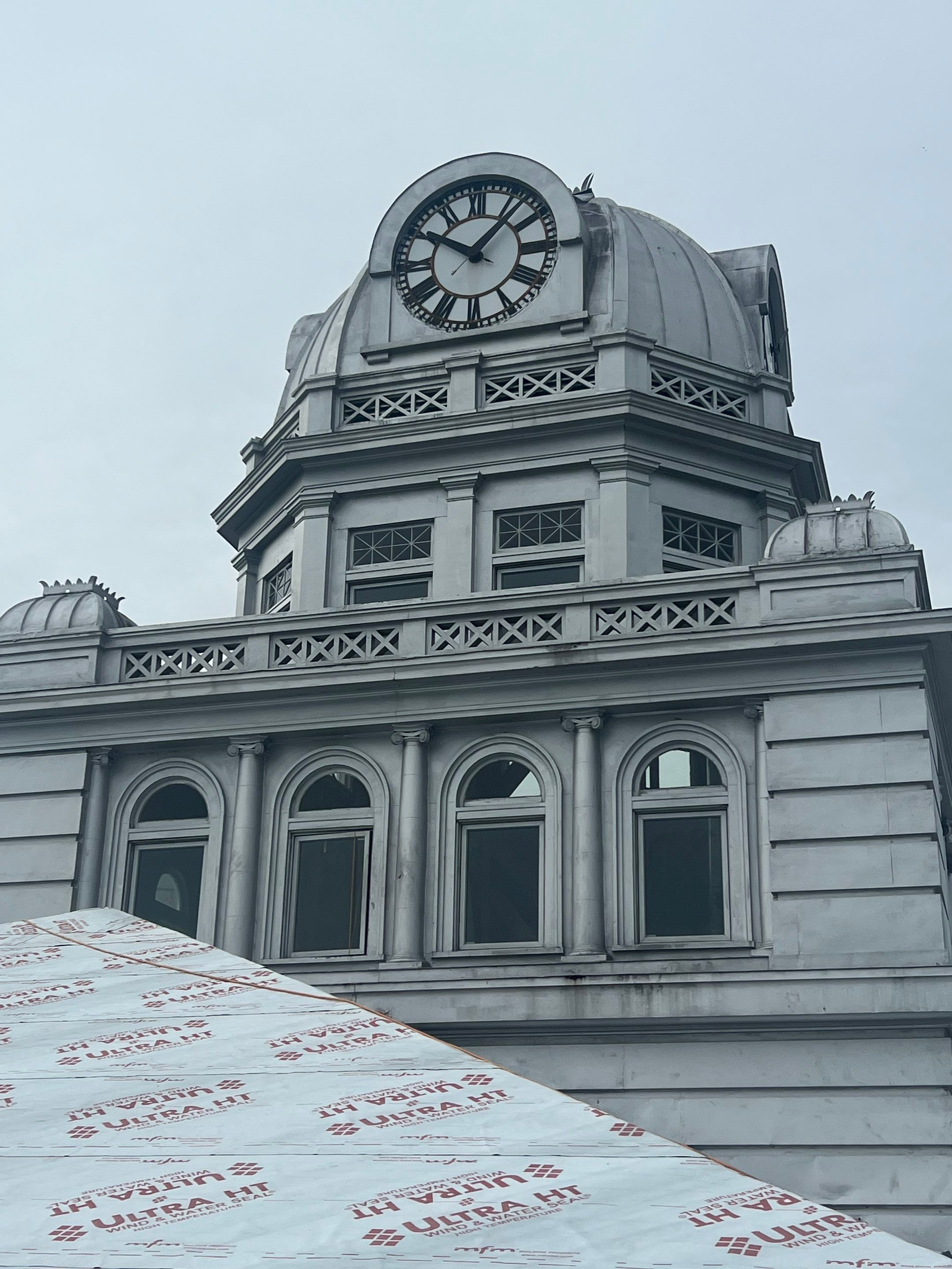 Madison County Courthouse clock tower — historic tile restoration